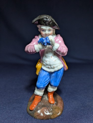 German porcelain figurine man - german,
