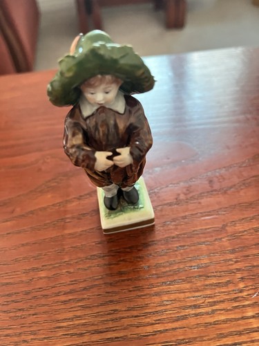 Polochrome porcelain begger - porcelain,